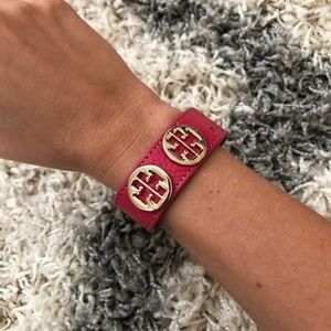 Tory Burch logo bracelet (flawed/missing stud)
